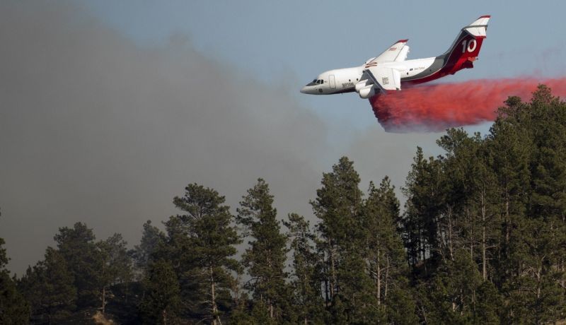 Rapid City: A heavy air tanker drops retardant onto the Auburn Fire near Deadwood Avenue on Tuesday, Oct. 5, 2021, in Rapid City, S.D. AP/PTI