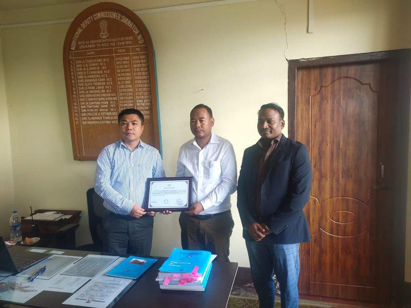 Newly elected MLA S Keoshu Yimchunger receiving the Certificate of Election from B Henok Buchem in the presence of general observer Nagarajan M. On the last day of withdrawal of nomination papers, the NDPP candidate S Keoshu Yimchunger was declared elected uncontested to be a member of the Nagaland Legislative Assembly from 58- Shamator- Chessore by the Returning Officer B Henok Buchem at the ADC office, Shamator on October 13.