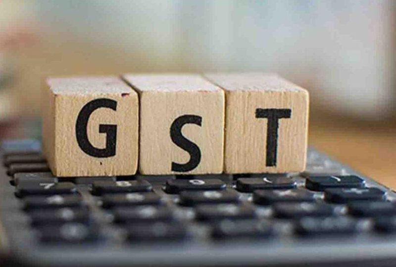 GST. Photo Courtesy: IANS NEWS