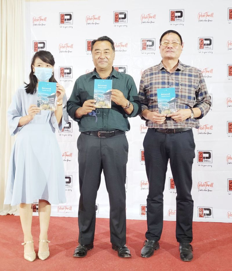 MLA Khriehu Liezietsu with author Kopelo Krome and Vishü Rita Krocha of PenThrill Publication House during the release of Krome’s “Beloved” in Kohima on October 18. (Morung Photo)