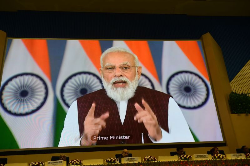 A screen shows Prime Minister Narendra Modi addresses via video conference during NHRC 28th Foundation Day in New Delhi on October 12, 2021. (PTI Photo)