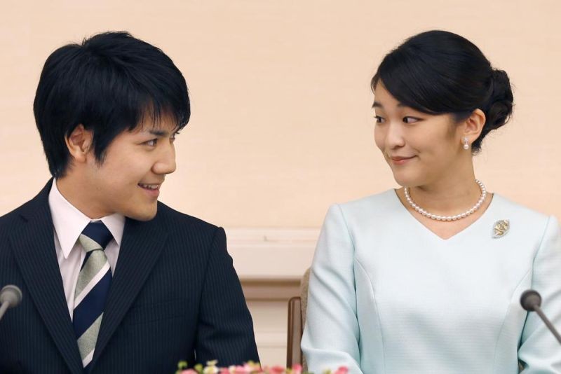 In this Sept. 3, 2017, file photo, Japan's Princess Mako and her fiance Kei Komuro look at each other during a press conference at Akasaka East Residence in Tokyo. Mako and Komuro are getting married next month but no wedding ceremonies are planned because their marriage is not fully supported by the pubic because of a financial dispute involving her future mother-in-law, the palace announced on October 1, 2021. (AP File Photo)
