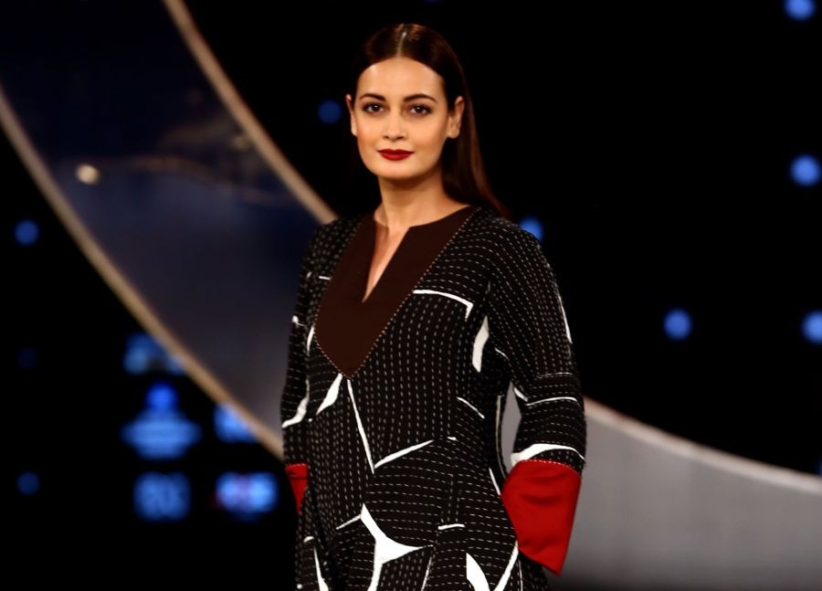 Mumbai: Bollywood actress Dia Mirza presents a creation by Indian designers Abraham and Thakore during the 'FDCI x Lakme Fashion Week' fashion show, in Mumbai, Friday, October 8, 2021. (PTI Photo)