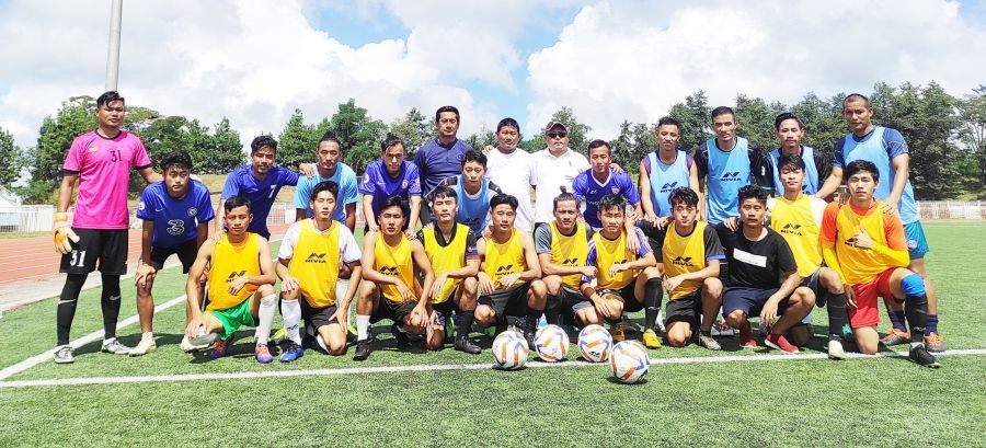 Footballers along with Nagaland Football Association vice president Mughato Aye and coaches at IG stadium Kohima on October 6. (Morung Photo)