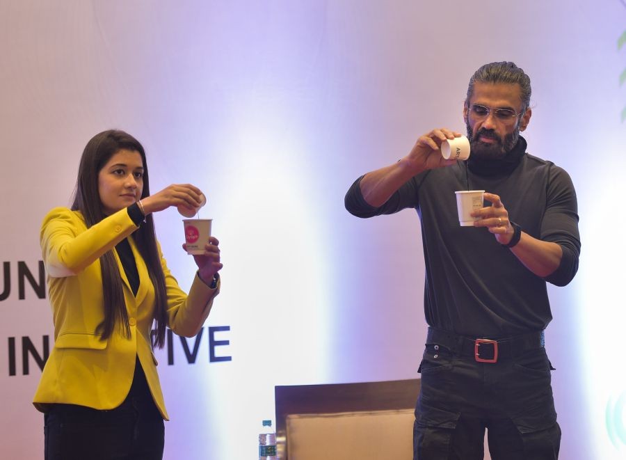 New Delhi: Bollywood actor Suniel Shetty along with co-founder Ezyspit Ritu Malhotra (L) doing demostration during the 'Spit Free India' campaign, in New Delhi, Sunday, Oct. 3, 2021. (PTI Photo/Shahbaz Khan)