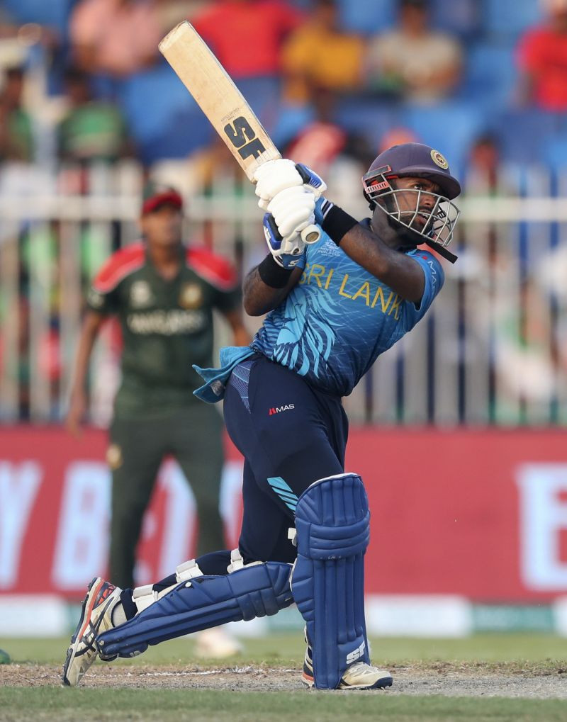 Sharjah: Sri Lanka's Charith Asalanka hits the ball for six runs during the Cricket Twenty20 World Cup match between Sri Lanka and Bangladesh in Sharjah, UAE, Sunday, Oct. 24, 2021. AP/PTI Photo