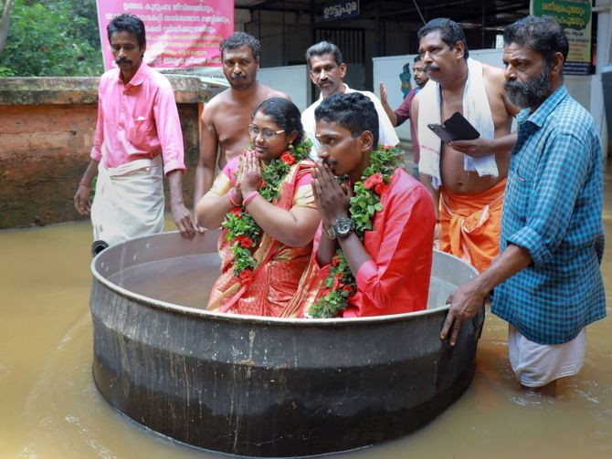 Kerala couple braves flood, sails in cooking vessel to get hitched |  MorungExpress | morungexpress.com