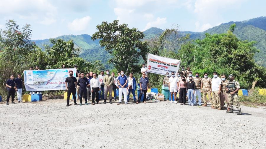 Forest Department officials and staff along with others during the cleanliness drive at Doyang.