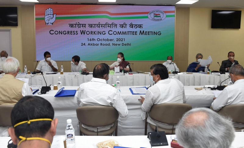 Congress Interim President Sonia Gandhi with party leader Rahul Gandhi and others during the Congress Working Committee (CWC) meeting to discuss the current political situation, upcoming Assembly polls, and organisational elections, at AICC headquarters in New Delhi, Saturday, Oct. 16, 2021. (PTI Photo/Kamal Singh)