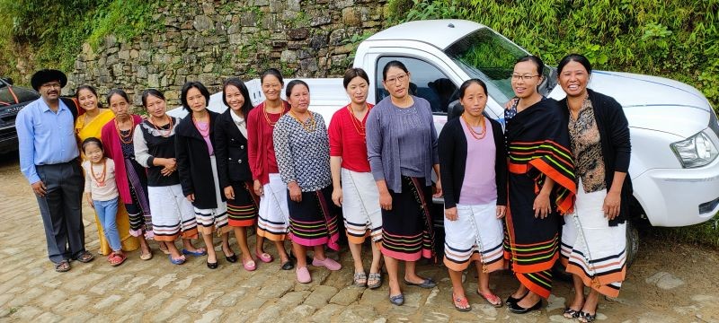 Members of Khonoma Women’s Organic Co-Operative Society during the ribbon-cutting ceremony of a pick-up truck donated by KLCT via Neelam Dutta on October 4 in Khonoma village.