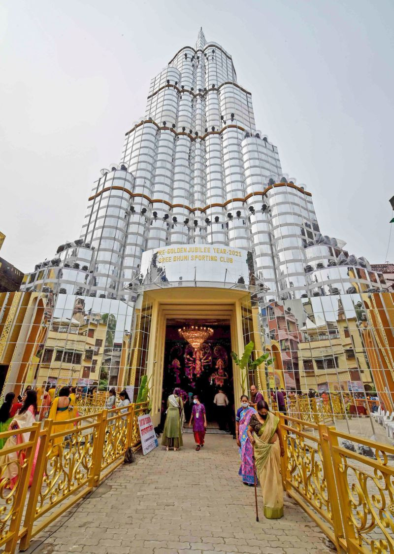 A Durga Puja Pandal or a makeshift worship venue is a replica of Dubai's iconic skyscraper Burj Khalifa, in Kolkata October 13, 2021.(PTI Photo)