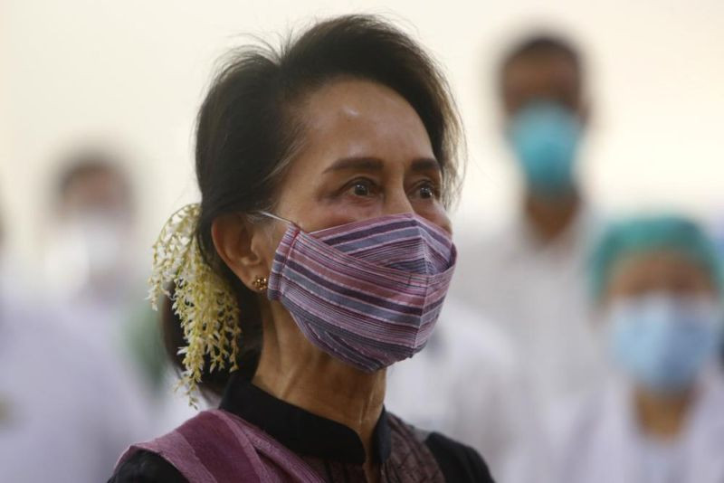 In this Jan 27, 2021, file photo, Myanmar leader Aung San Suu Kyi watches the vaccination of health workers at hospital in Naypyitaw, Myanmar. A court in Myanmar ruled Tuesday that the trial on charges of incitement of ousted national leader Aung San Suu Kyi and two of her political allies proceed to its substantive second phase, in which the defendants can present their case. Suu Kyi and her elected government were ousted by a military takeover in February. (AP File Photo)