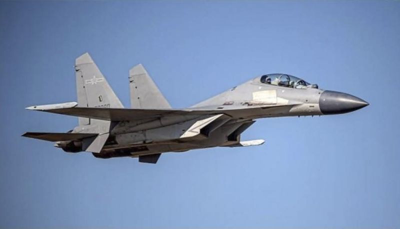 In this undated file photo released by the Taiwan Ministry of Defense, a Chinese PLA J-16 fighter jet flies in an undisclosed location. China says a recent increase in military exercises and warplane missions near Taiwan are necessary to defend national sovereignty and territorial integrity. (AP File Photo)