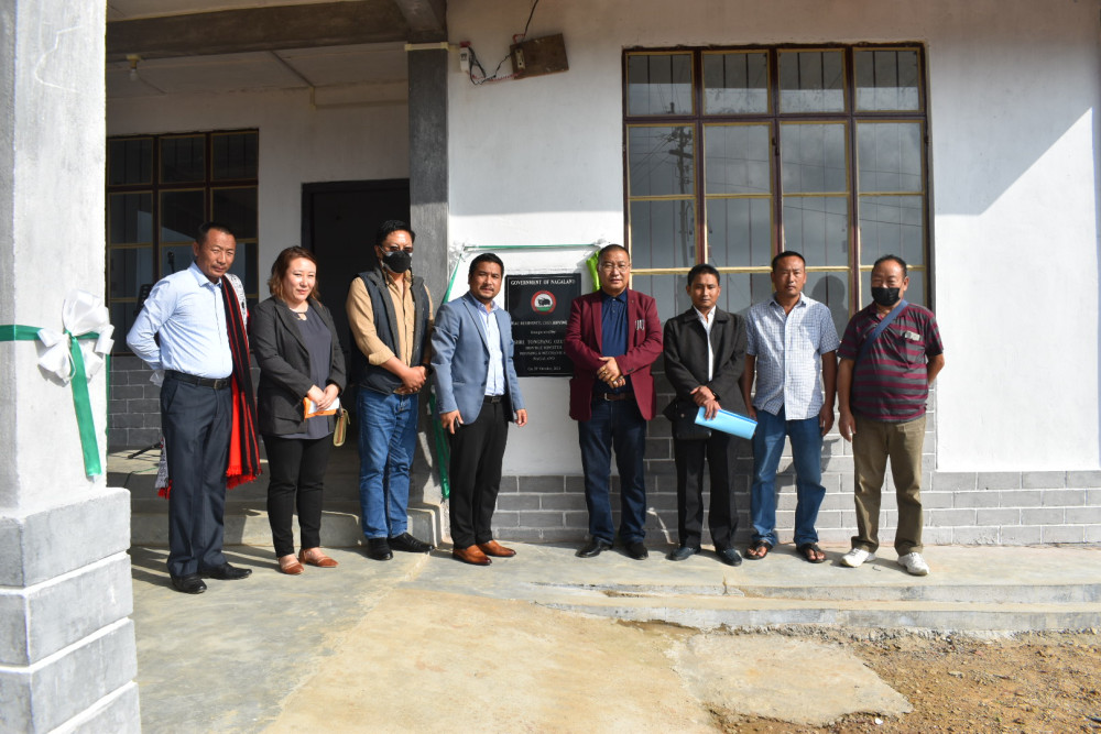 Minister Tongpang Ozukum with other officials during the inauguration of the new EAC quarter at Chuchuyimlang on October 28.