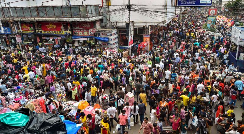 Crowded New Market area ahead of the Durga Puja festival, in Kolkata on October 10, 2021. (PTI Photo)