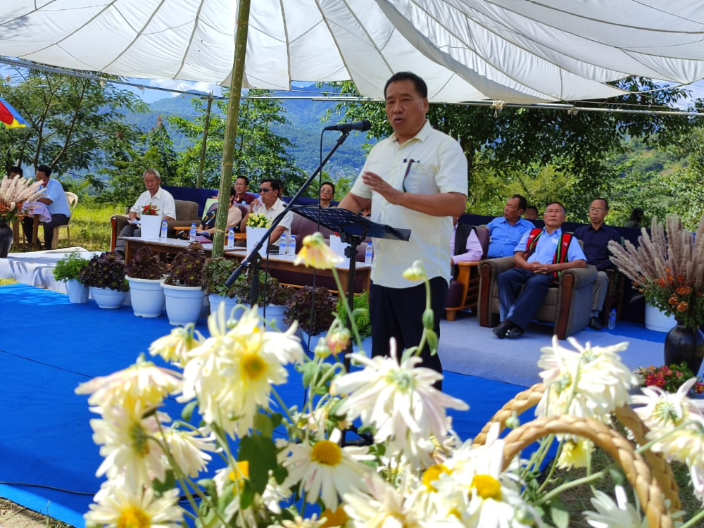 L. Dikho addressing the gathering during the village leaders and party workers get-together program of 48-Mao Assembly Constituency at Asufii, Mao on October 14.