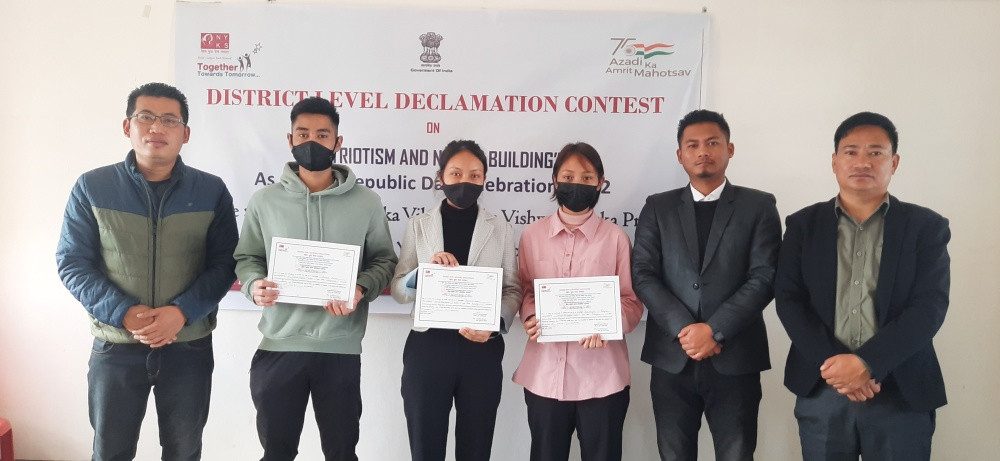 Winners of the District Level declamation contest organized by NYK, Mokokchung with the judges.