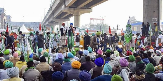 Farmers stage a protest at Tikri border during their agitation against Centre's new farm laws. (PTI File Photo)