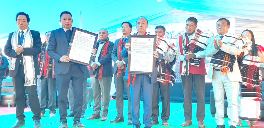 SAPO and Maram Khullen exchanging reaffirmation accord during the traditional brotherhood feast at Zhodi Ground, Jakhama on November 24.