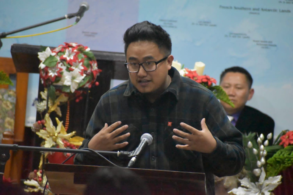 Husezo Rhakho sharing testimony on Sunday.