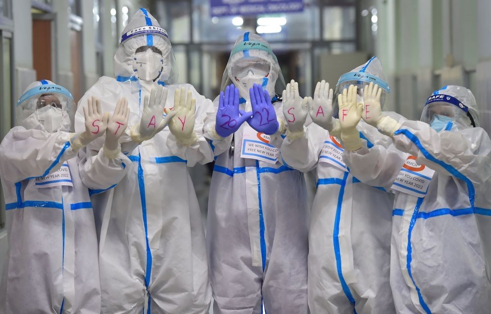 Bengaluru: Medical staff of M S Ramaiah hospital wearing PPE and gloves pose for photographs on New Year's eve amid concern over rising Omicron cases, in Bengaluru, Friday, Dec. 31, 2021. (PTI Photo/Shailendra Bhojak)