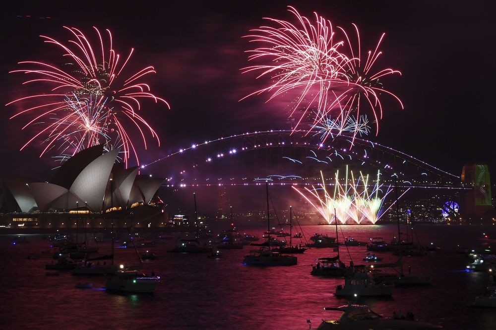 Sydney:Fireworks explode over the Sydney Opera House and Harbour Bridge as New Year's Eve celebrations begin in Sydney, Friday, Dec. 31, 2021.AP/PTI Photo(