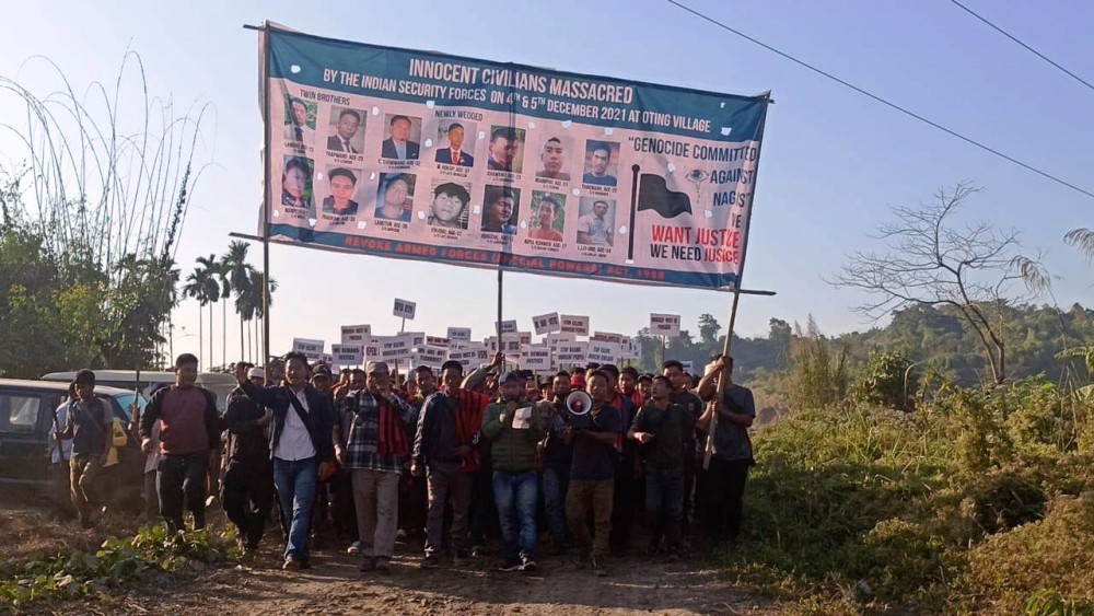 People of Oting village and neighbouring villages march to the December 4 incident site on December 20.