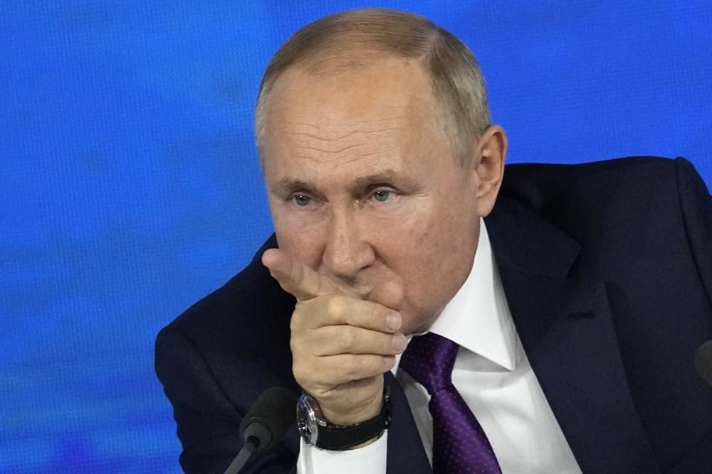 Russian President Vladimir Putin gestures while speaking during his annual news conference in Moscow, Russia, Thursday, Dec. 23, 2021. (AP Photo/Alexander Zemlianichenko)