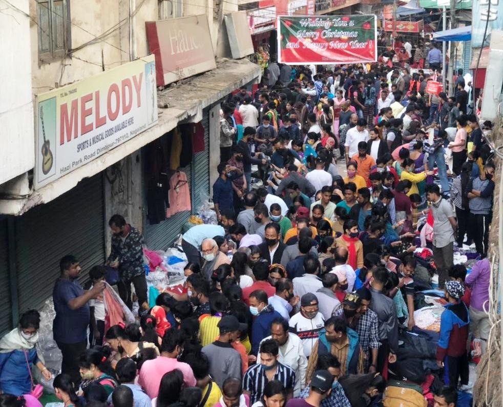 With Christmas Day fast approaching, popular shopping areas like the Hazi Park Road in Hong Kong Market were seen crowded with shoppers, many without masks, with no scope for social distancing in the cramped space. (Morung File Photo)