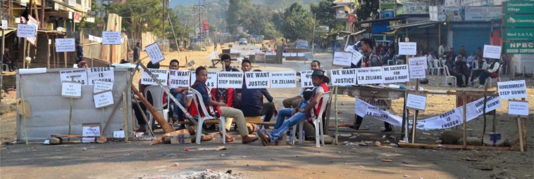 Bandh supporters block the highway during a strike call given by Joint Coordination Committee against 33% women's reservation and killing of two person in police firing in Dimapur. (PTI File Photo)
