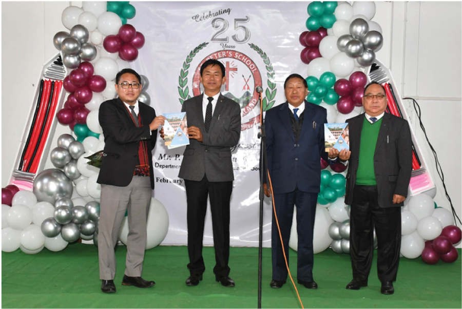 Guest and officials release the silver jubilee souvenir ‘VISION’ of St Peter’s School, Purana Bazar, Dimapur on February 8.