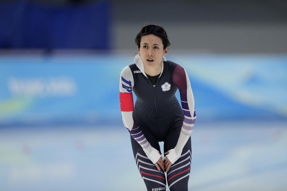 Huang Yu-ting of Taiwan reacts after her heat in the speedskating women's 500-meter race at the 2022 Winter Olympics, Sunday, Feb. 13, 2022, in Beijing. (AP Photo/Ashley Landis)