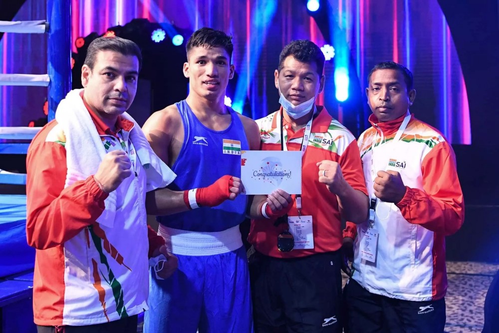 India's Jaydeep Rawat poses with the coaches after winning the quarter-final bout on Day 4 at the ASBC Asian Youth & Junior Boxing Championships in Dubai (Source: Boxing India)  https://thebridge.in/boxing/four-indian-asian-youth-boxing-semifinals-24609