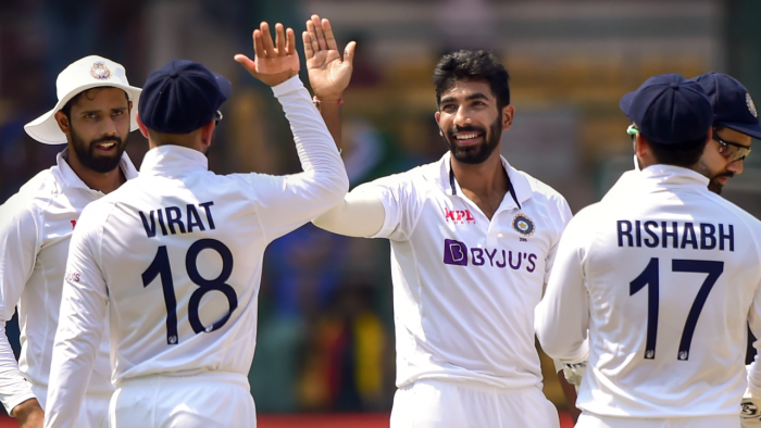 Jasprit Bumrah celebrates with teammates after the wicket of Sri Lanka's batsman Niroshan Dickwella, during the second day of the second test cricket match between India and Sri Lanka. Credit: PTI Photo