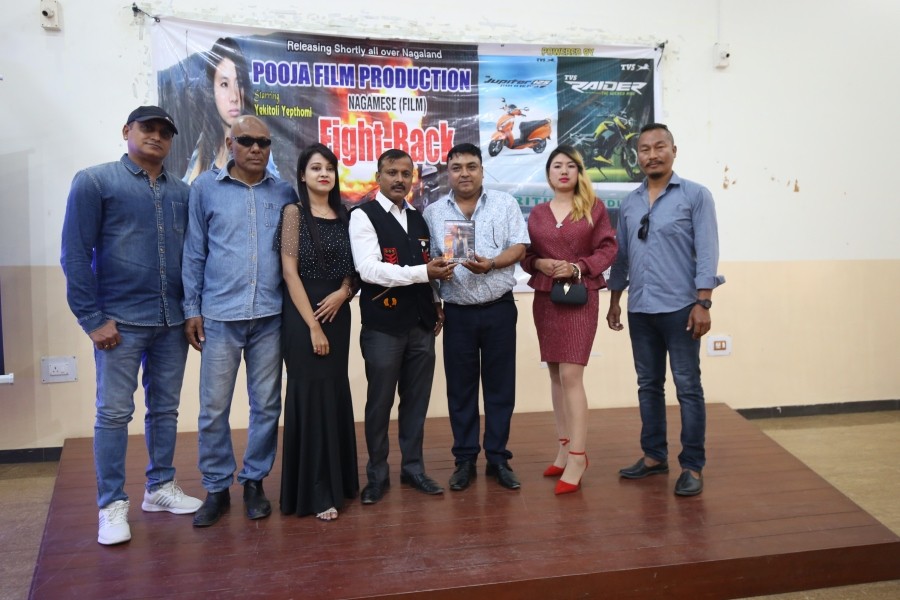 Film director Ajay Kumar, (second from left) and main star of the film, Yekitoli Yepthomi (second from right) during the launch of ‘Fight Back’ along with guest and invitees at the Tourist Lodge, March 20. (Morung Photo)