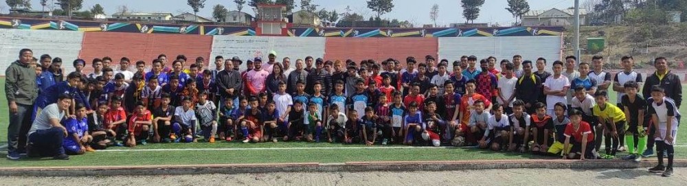 Nagaland’s youth resources and sports director Akumla Chuba along with Kohima Town Club officials and others at Indira Gandhi Stadium, Kohima on March 1.