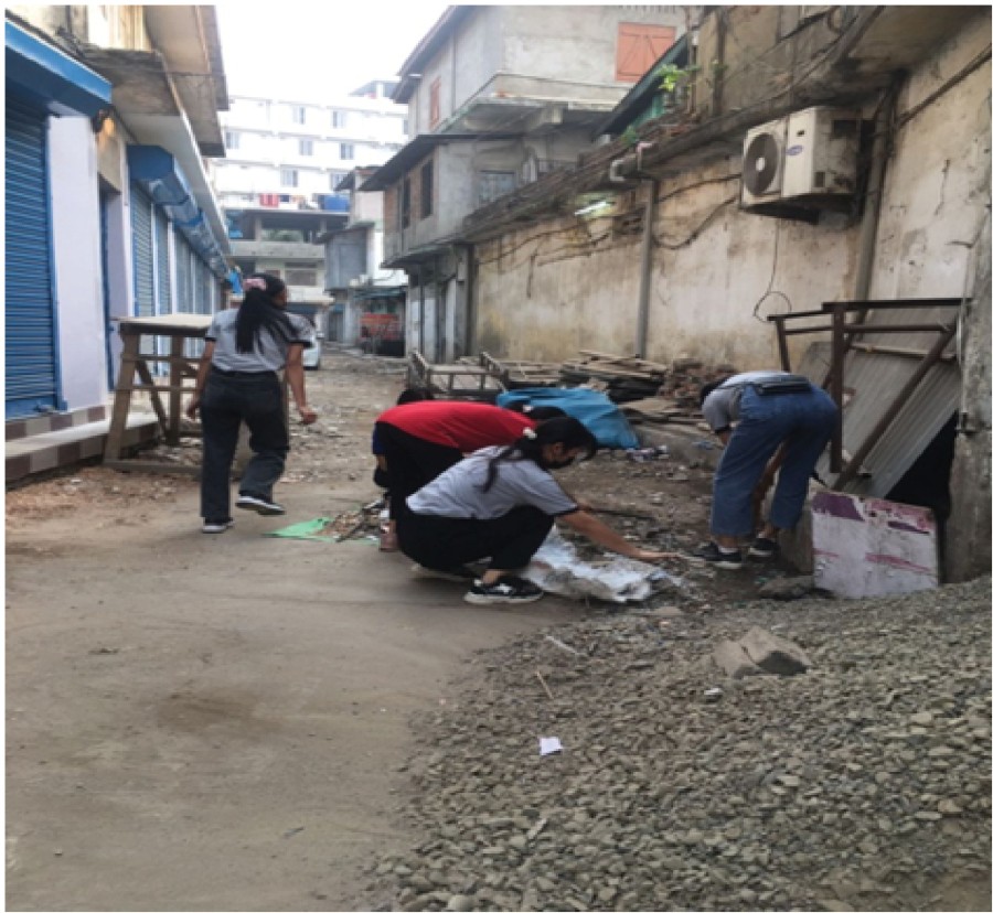The NSS unit of Dimapur Government College (DGC) in collaboration with TEAM GREEN organized a social work in Dimapur, Bata Charali Junction on March 18. DGC Principal, Dr M Libanthung Ngullie, one Associate Professor, three Programme Officers, 27 NSS volunteers, TEAM GREEN volunteers and DMC employees took part in the clean-up. (Photo Courtesy: DGC)