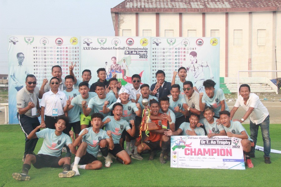 A jubilant Dimapur team with the Dr T Ao Trophy in Mokokchung on April 29.