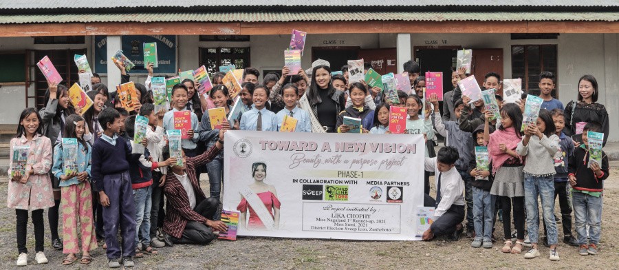 Lika Chophy with children of a government school during her tour in Zunheboto district.
