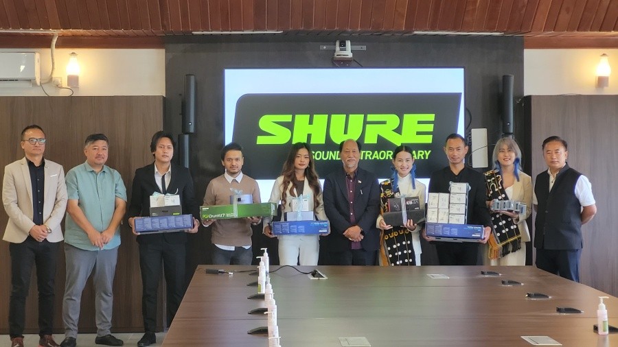 Chief Minister Neiphiu Rio and others with Naga artists during the presentation of Shure musical equipment in Kohima on April 22. (Morung Photo)