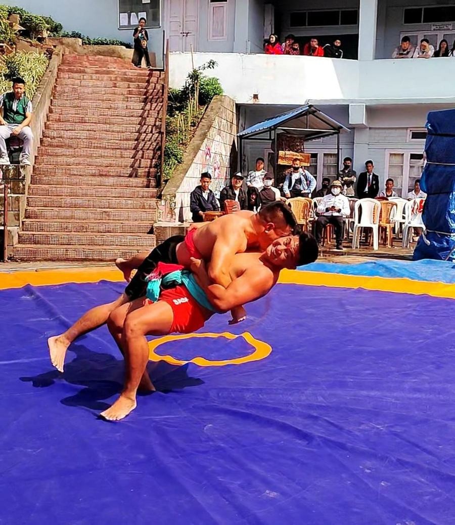 Wrestlers in action during the 1st Inter-College Naga Wrestling competition organized by Alder College Kohima as part its two day Alder Fest 2022.