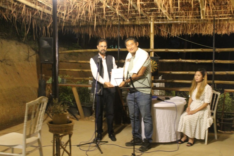 Watinungsang Imsong being felicitated by A Rahman during the event at IFBC, Indisen on April 3. (Morung Photo)
