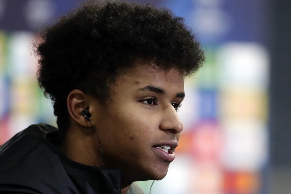 FILE - Salzburg's Karim Adeyemi speaks after the Champions League Group G soccer match between RB Salzburg and Sevilla at the Red Bull Arena in Salzburg, Austria, Dec. 8, 2021. Borussia Dortmund signed Germany forward Karim Adeyemi from Austrian champion Salzburg on Tuesday May 10, 2022. The Bundesliga club said the 20-year-old Adeyemi signed a contract through June 2027 after completing a medical examination in Dortmund earlier in the day. (AP Photo/Lisa Leutner, File)