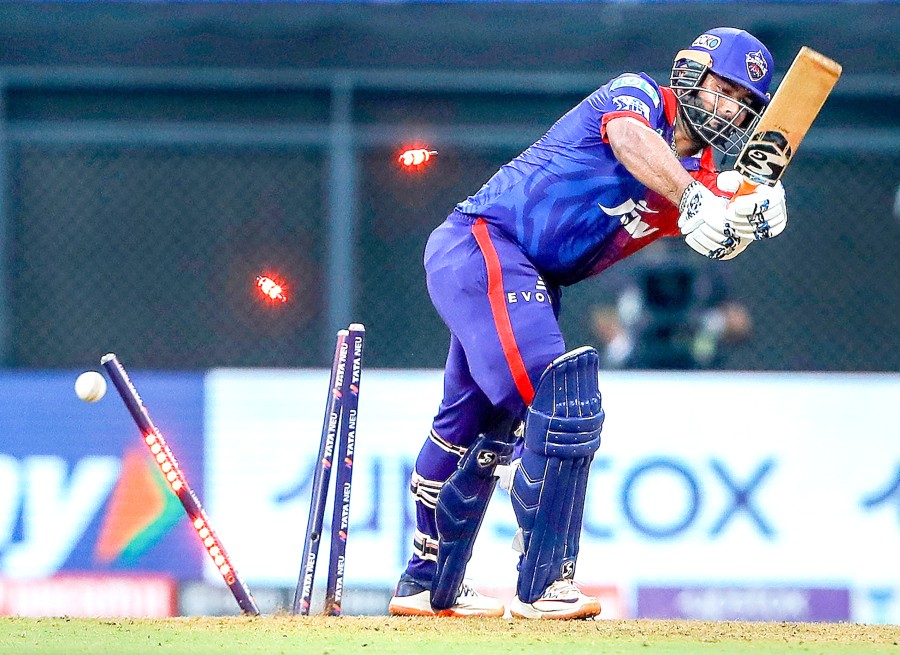 Rishabh Pant, captain of Delhi Capitals being bowled out during the Indian Premier League 2022 cricket match between Delhi Capitals and Lucknow Super Giants, at the Wankhede Stadium in Mumbai May 1. (Sportzpics for IPL/PTI Photo)