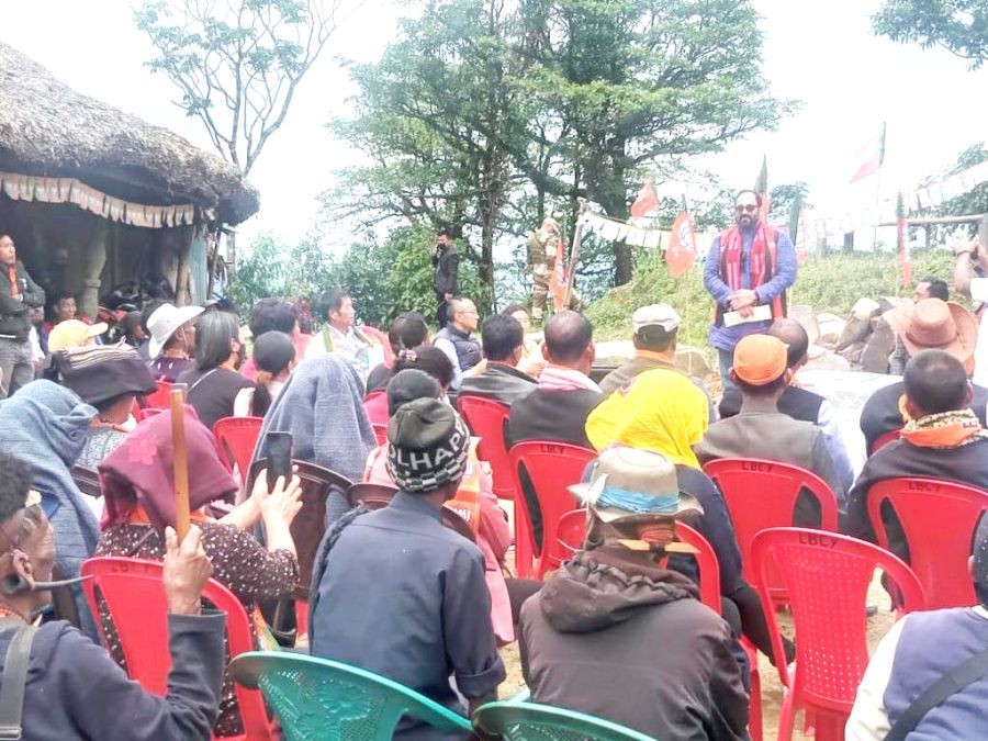 Union Minister Rajeev Chandrasekhar interacting with village elders and leaders of Longwa village. (Photo Courtesy: PIB)