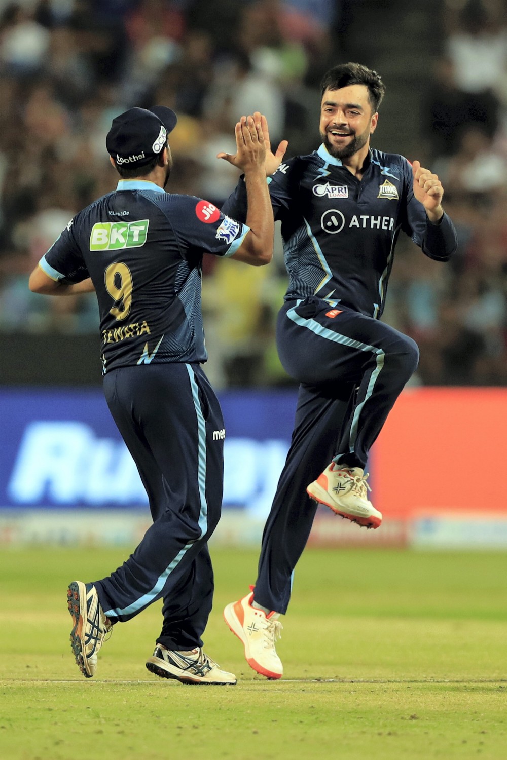 Rashid Khan of Gujarat Titans celebrates the wicket of Krunal Pandya of Lucknow Super Giants, during the Indian Premier League 2022 cricket match between Lucknow Super Giants and Gujarat Titans, at the MCA International Stadium in Pune, Tuesday, May 10, 2022. (Sportzpics for IPL/PTI Photo)(PTI05_10_2022_000272B)