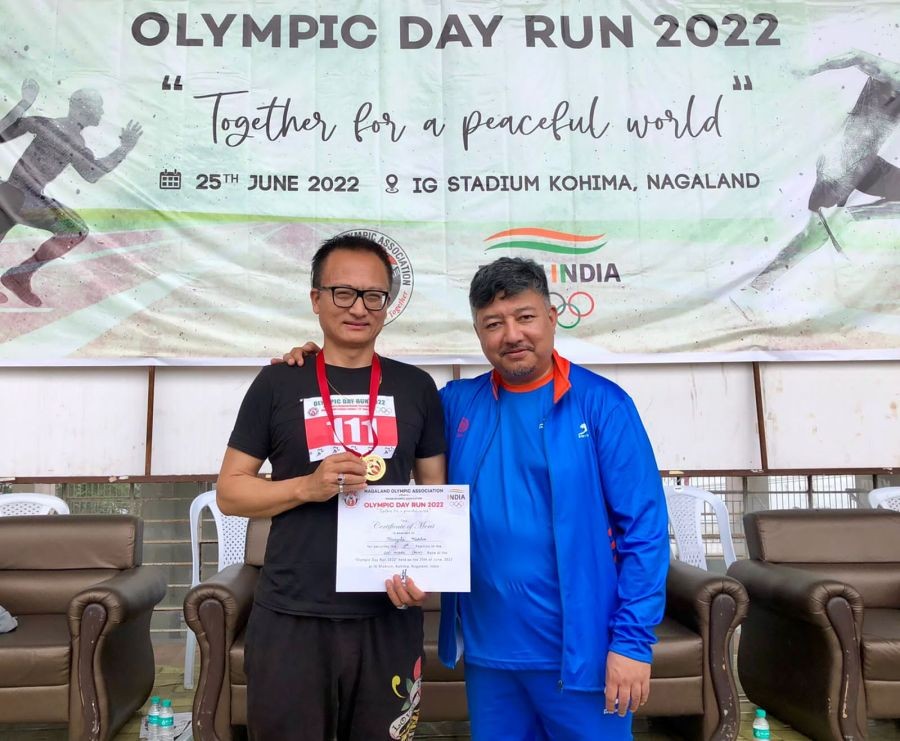 Abu Metha, Advisor to Chief Minister Nagaland and Secretary General, Nagaland Olympic Association with Theja Meru, Advisor, Task Force for Music & Arts Nagaland during the Olympic Day Run in Kohima on June 25. (Morung Photo)