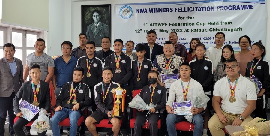 Abu Metha with NWA officials and Naga wrestlers during felicitation programme in Kohima on June 6. (Morung Photo)