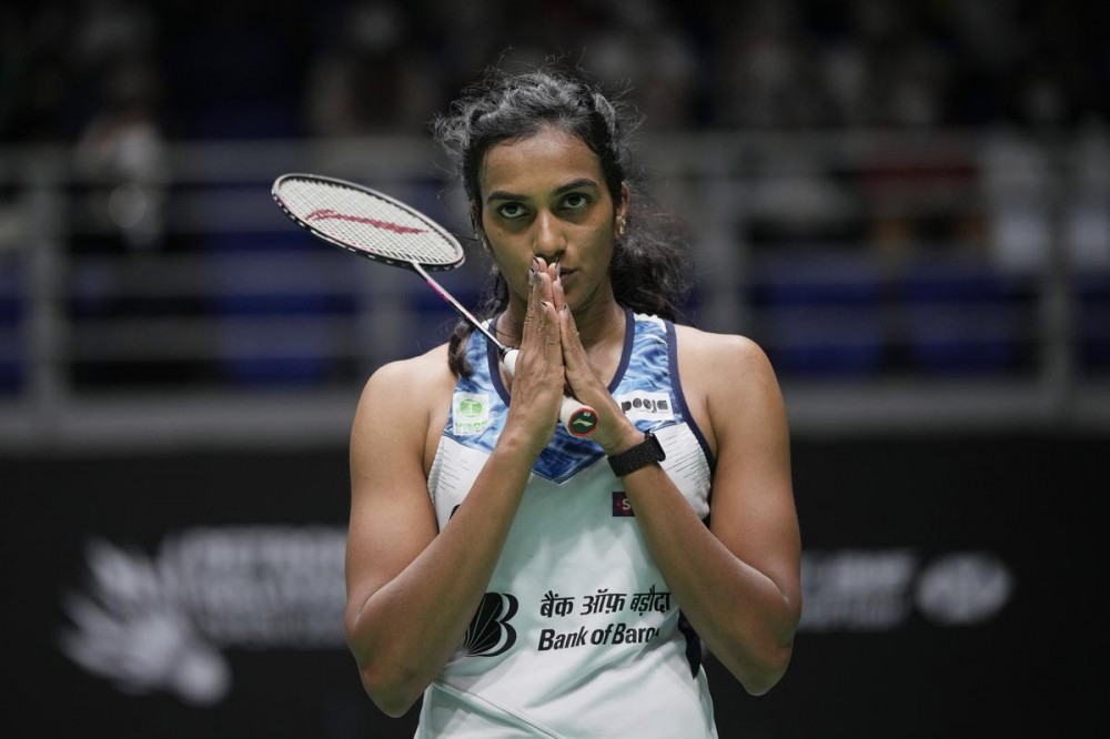 P.V. Sindhu reacts after winning the match against Thailand’s Pornpawee Chochuwong during their women’s singles first round match at Malaysia Open badminton tournament at Bukit Jalil indoor stadium in Kuala Lumpur, Malaysia, on June 29, 2022. | Photo Credit: AP