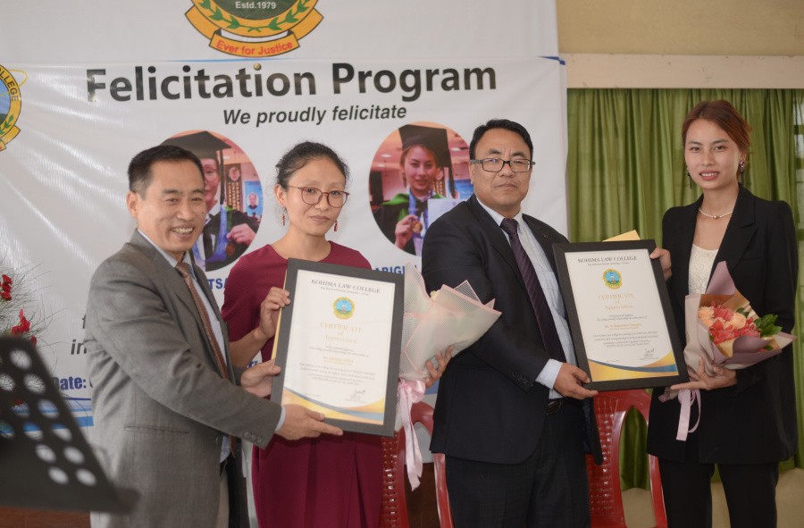 Gold medal awardees R WonchibeniTsanglao and AbigialLotha with Asst. Professor KezhokhotoSavi and Administrator Limaakum.